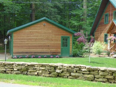 Oversized 2 car garage w/shop space offers extra o