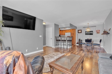 Living area featuring light wood-style flooring an