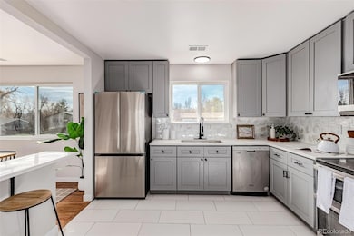 Updated, eat-in kitchen with new refrigerator.