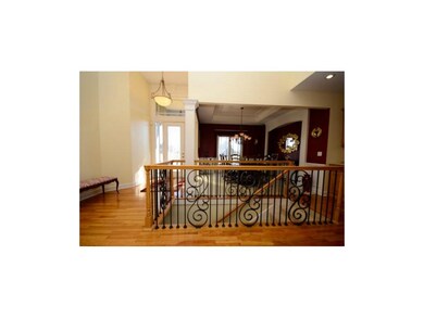 Custom Designed Iron Spindles surround the lower l