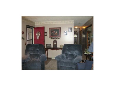 Living Room Front Door - looking down hallway to b
