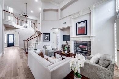 Light and bright living area with elevated ceiling