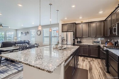 8129 S Jackson Gap St, Aurora, CO 80016 - photo 4