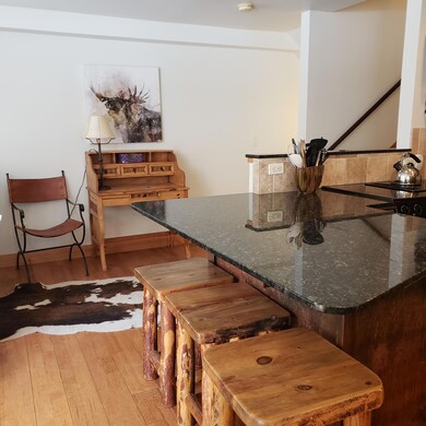 TL 420 entry: bar stools @ kitchen bar
