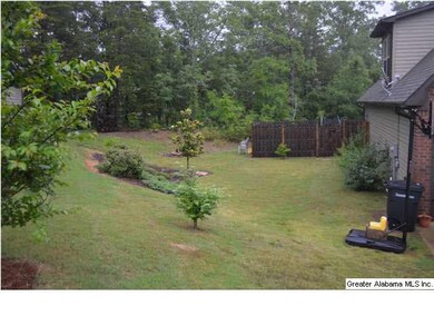Left side of the house. Notice the woods in the re