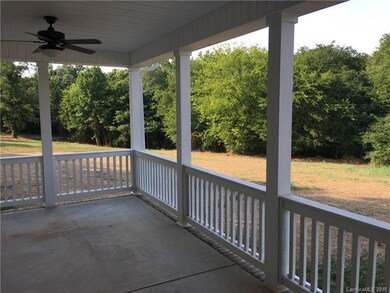 Enjoy morning coffee and views on your covered rea