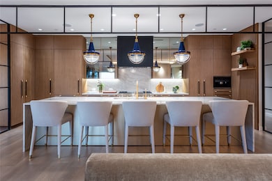 Waterfall Aria White Pearl Quartzite Island, Breakfast Bar & pendants.