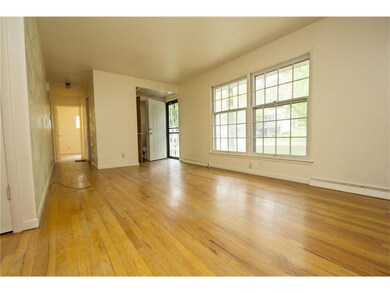 Enter into the living room offering large windows 