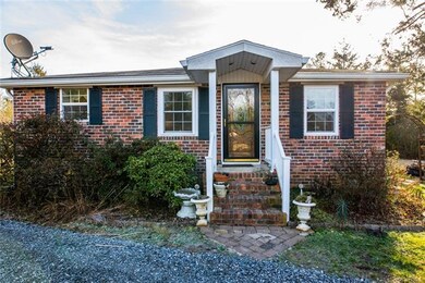 Covered Front stoop with beautiful front door
