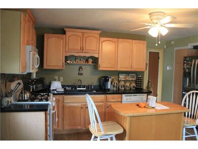Kitchen. Upgraded cabinets and functional island