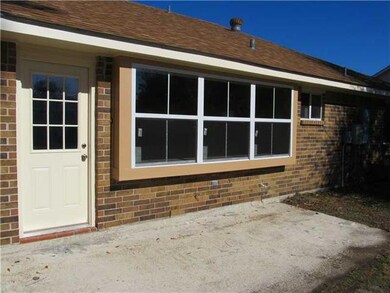 Patio/Deck. Back patio faces den s wall of windows