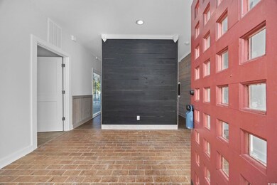 Entryway with wood walls