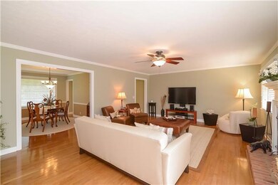 Another view of the living room onlooking into the dining room area. Entertaining in this home comes easy!