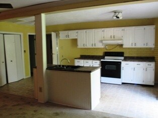 Kitchen with island, new sink, composite.    Lots 