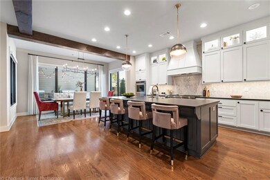 Heart of every home is the kitchen; large island, big pantry and more.