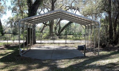 Two Carport on concrete Pad with Double Gates. Has