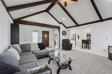 Great Room view of Entryway and Kitchen/Dining Are