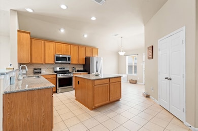 Large kitchen with plenty of countertop space and a breakfast nook