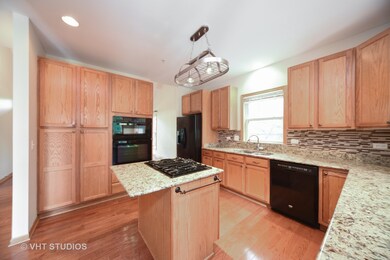 Kitchen has great Wall Pantry with pull out drawer