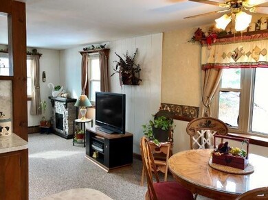 Dining room and living room and...