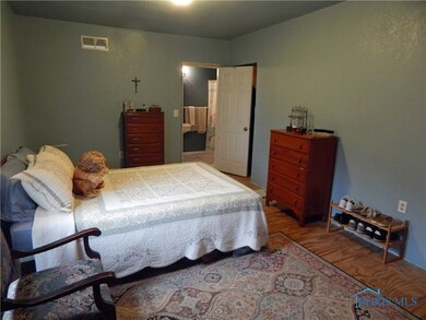 Master bedroom on main floor. Doorway leads to mas