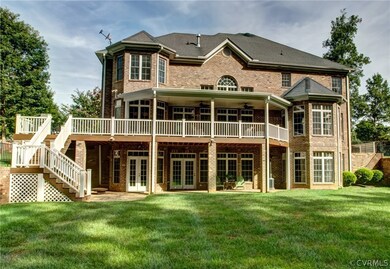Rear view of home showing covered back porch and l