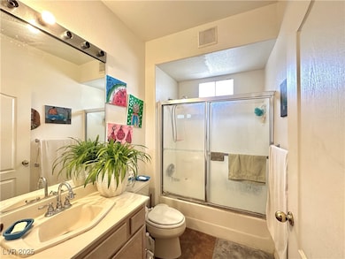 Full bath featuring vanity, tile patterned floorin