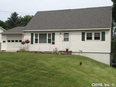Exterior Front. This house has vinyl siding, newer