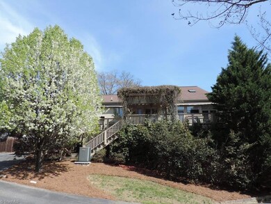 Very large deck with trellis supporting vines for shade