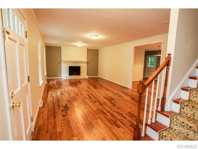 Open floor plan with newly refinished hardwood sta
