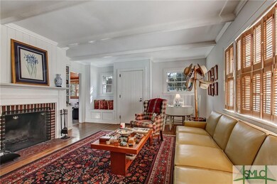 Charming family room with wood burning fireplace a