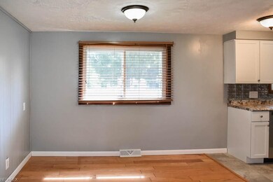 Hardwood flooring in the dining room.