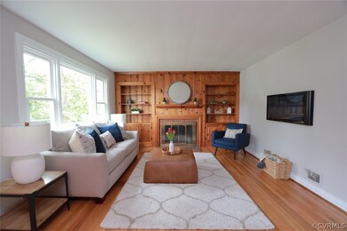 Light filled Living room with fireplace, built in