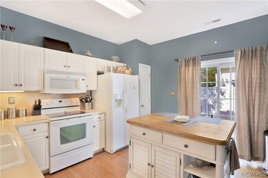 Kitchen with Sliding Doors to Patio and new Center Island