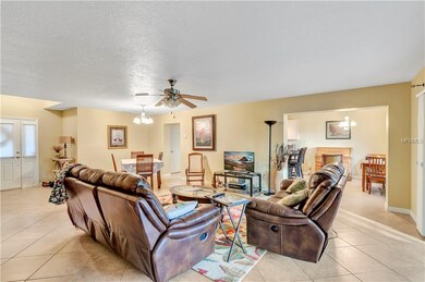 Great Room looking in to breakfast nook with bar top & table