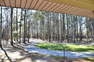 wooded FRONT YARD