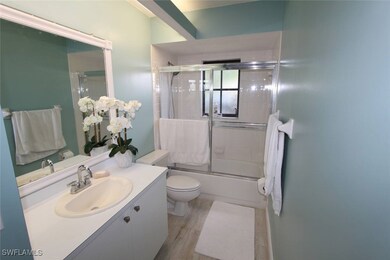 Full bathroom featuring vanity, toilet, bath / sho
