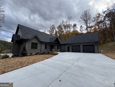 Front elevation of home and garage on main level.