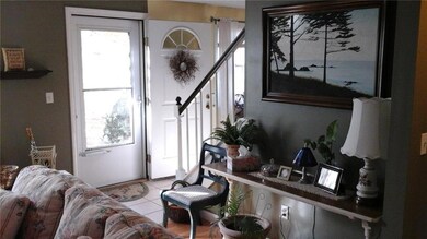 Front door & stairs to upstairs 2...