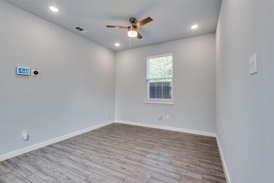 Living room featuring light hardwood / wood-style 