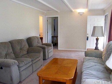 Living Room. Kitchen and Bedroom off one end of ro