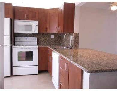 1300 NE 191st St unit A104, Miami, FL 33179 - photo 4