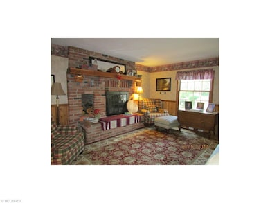 The living room is open to the dining room and kit