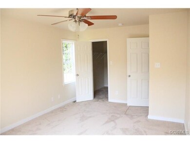 First Floor Master Bedroom. Large Walk-in Closet. To be built. This picture is a representation of a similar house.
