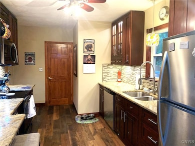 The door at the far end of the picture leads to th
