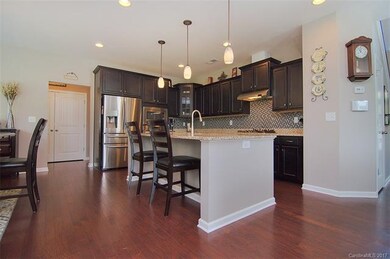 Beautiful Glass Tile Backsplash and Glass accented