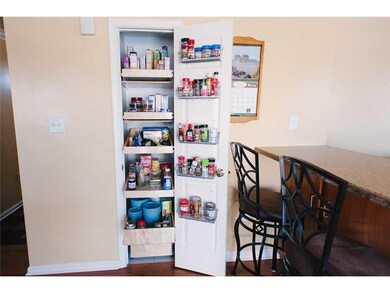 Kitchen. Custom pull out shelves in pantry maximiz