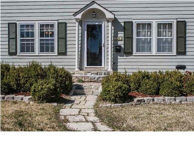 Lovely stone entry walkway and patio. Terraced gar