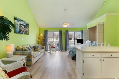 Living room with light wood-type flooring, ceiling