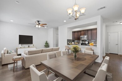 Dining space featuring dark wood finished floors,